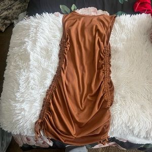brown skin tight dress with ties on both sides